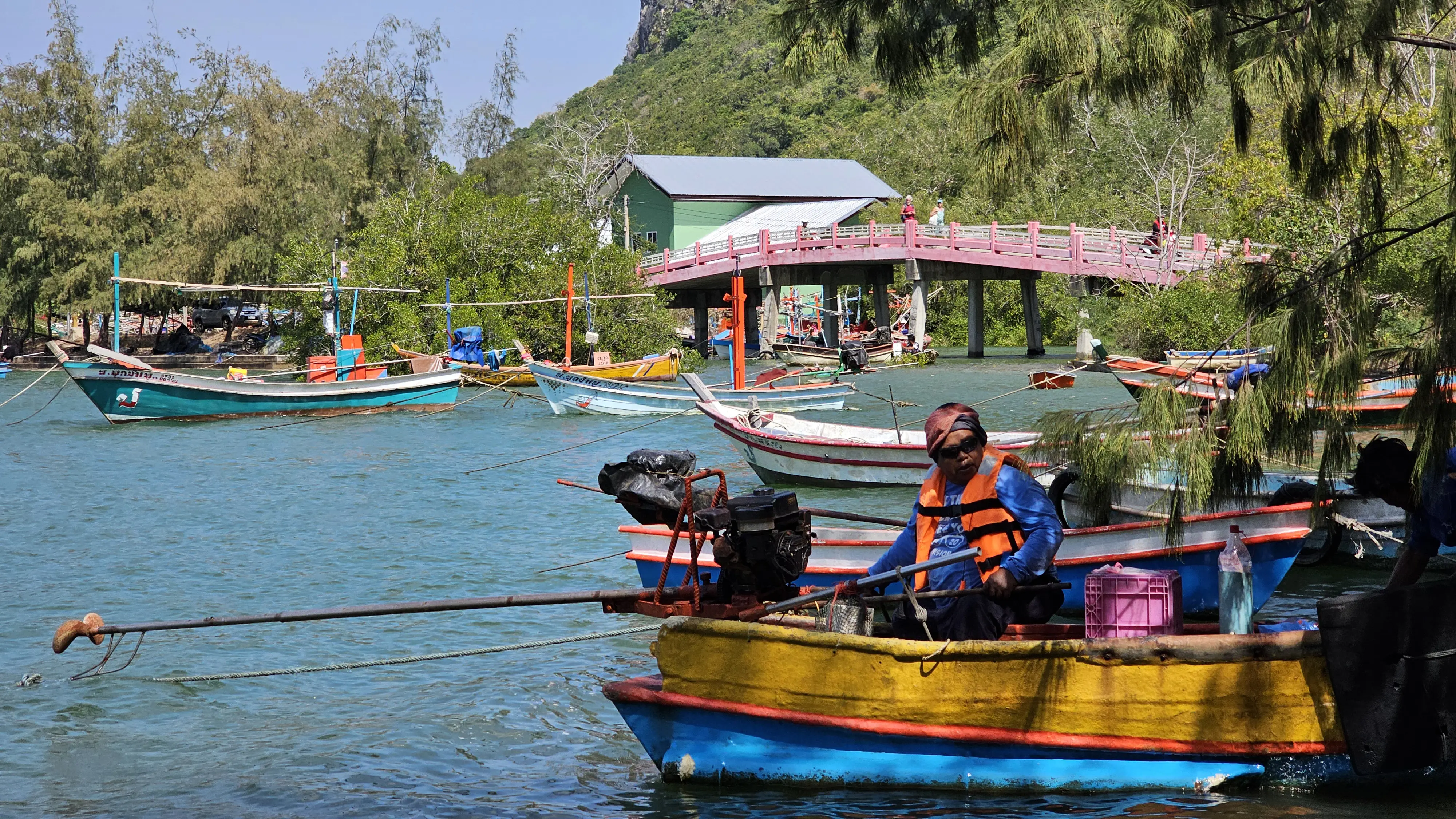 Fisherman leaving the sheltered bay